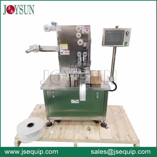 Auto-desiccant-insertion-machine